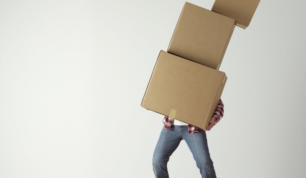 person with boxes