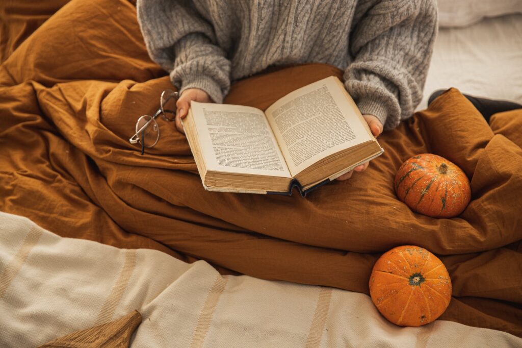 brown book on brown textile