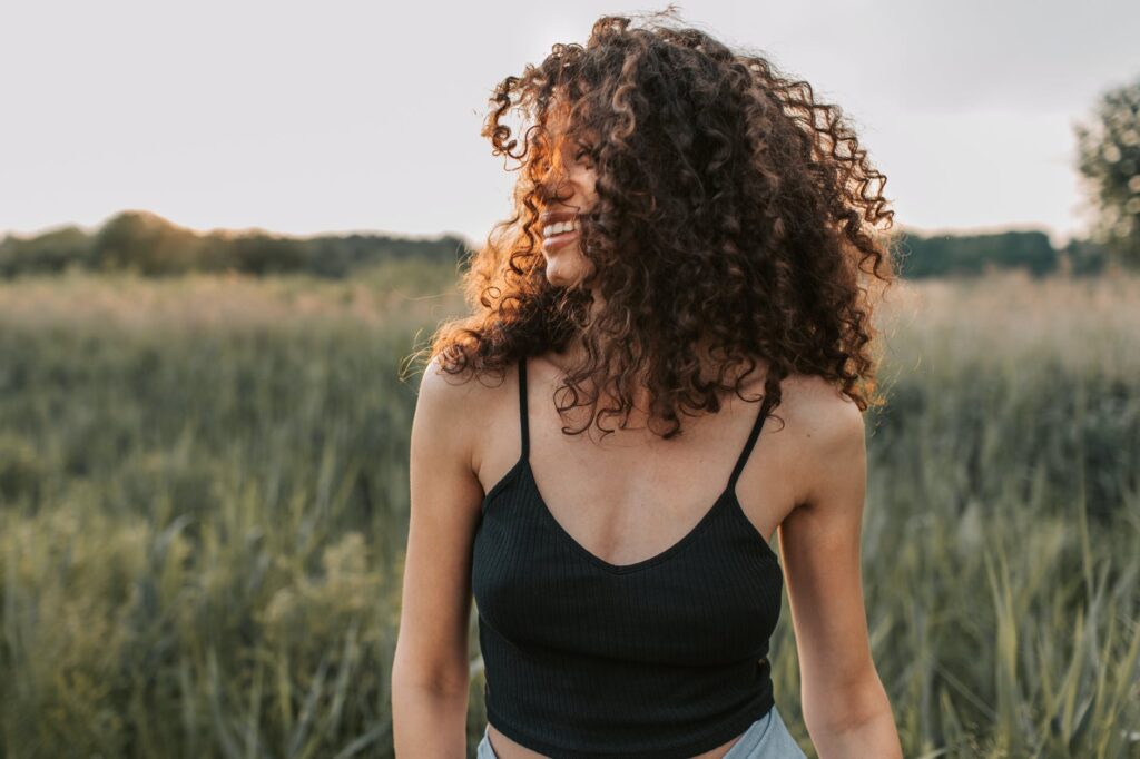 photo of woman wearing black tank top